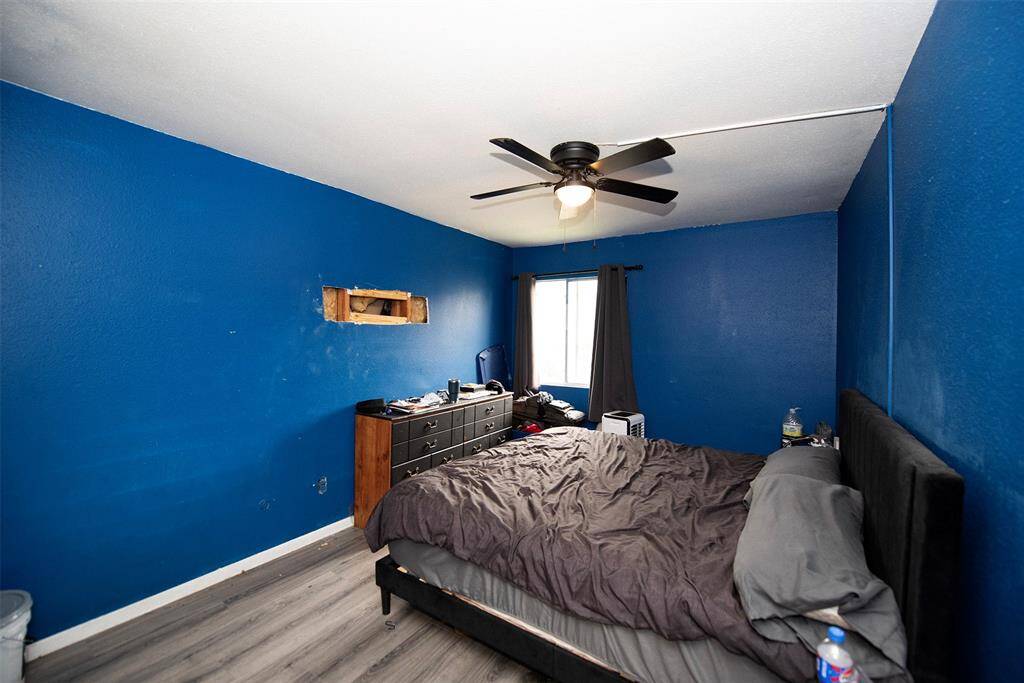 Primary bedroom with space for your king sized furniture. Some drywall repairs is needed.