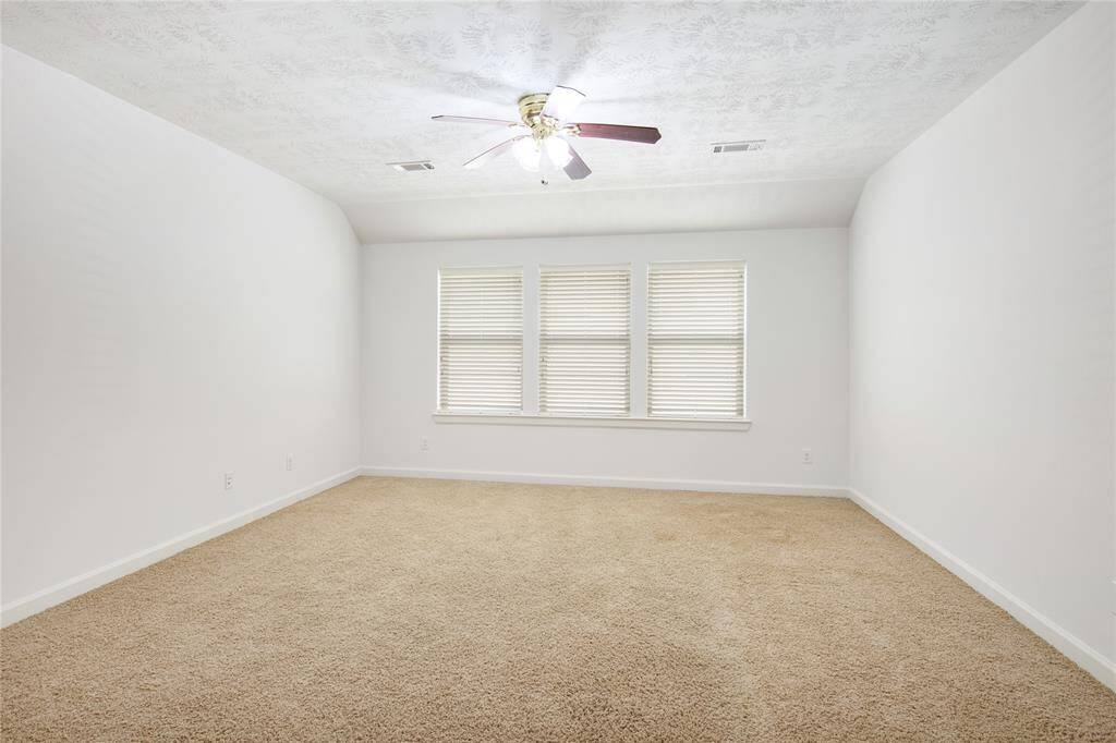 The upstairs gameroom is a versatile haven, perfect for making it your own personal retreat. With ample space for games, entertainment, or a cozy movie night, it invites creativity and relaxation. Whether you envision a vibrant game area, a peaceful reading nook, or a fun playroom, this adaptable space can easily cater to your lifestyle and hobbies.