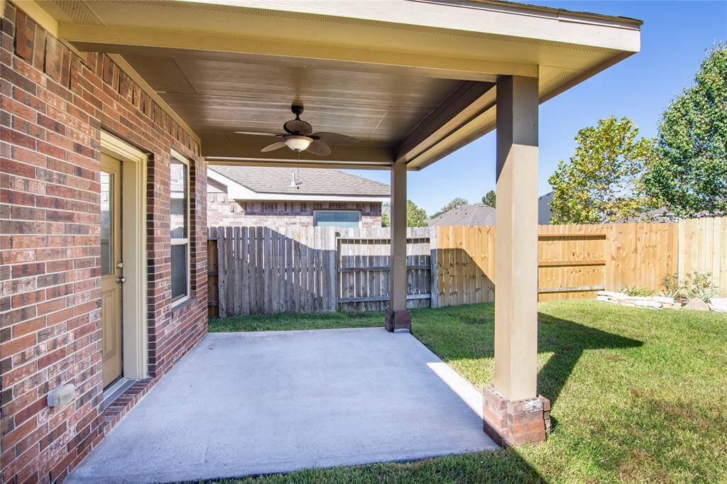 Enjoy outdoor living in your backyard, complete with a covered patio.