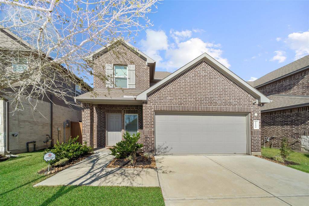 Experience the perfect blend of timeless charm and contemporary style with this modern brick home.