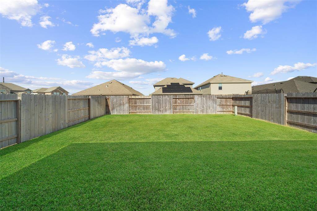 The backyard offers plenty of privacy with ample space between you and your back neighbors, creating a peaceful and secluded outdoor retreat.