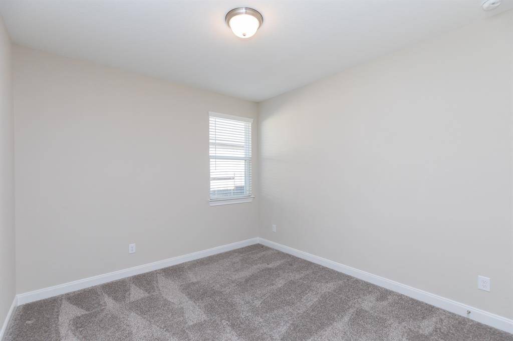 One of the other 3 bedrooms