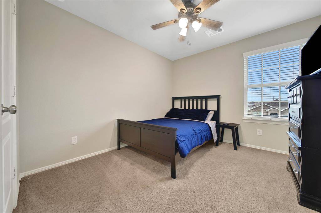 This secondary bedroom is ready for sweet dreams.