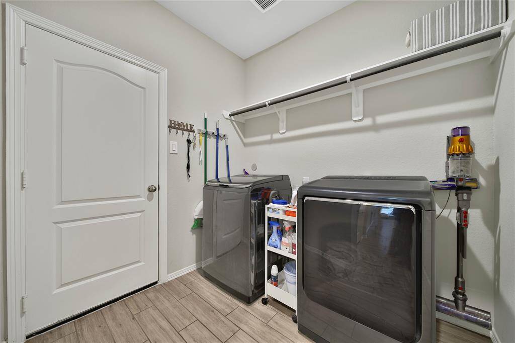 This convenient utility room opens directly to the garage.
