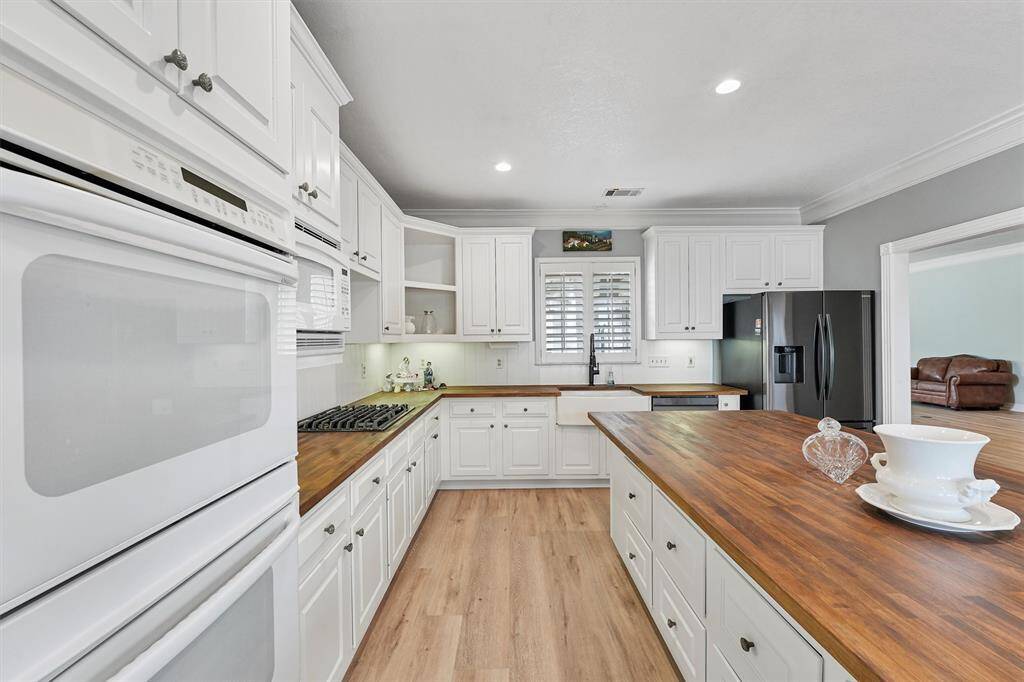 Kitchen is a spacious gathering area with lots of counter space