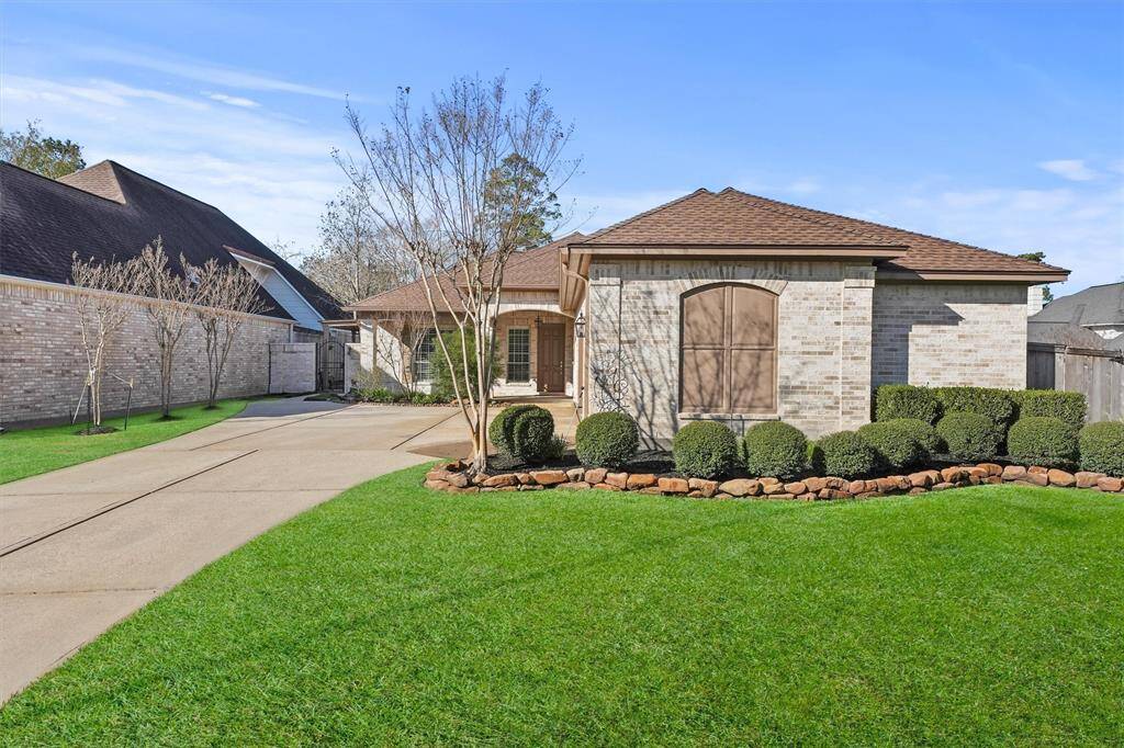 Featuring double driveway and over sized garage on corner lot.