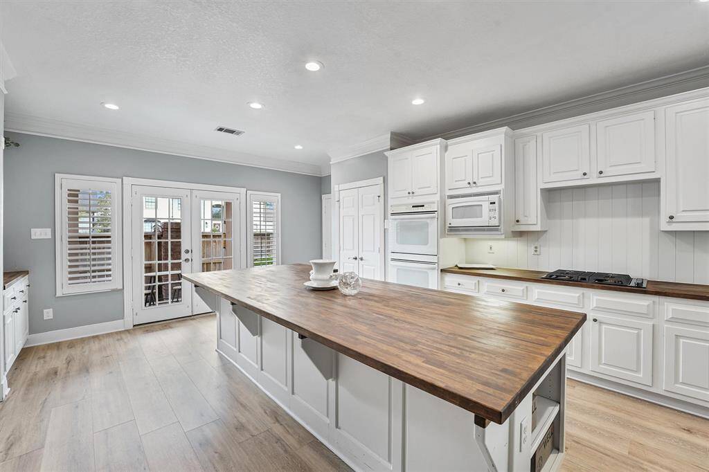 Updated Kitchen with Butcher Block Countertop and farmhouse sink