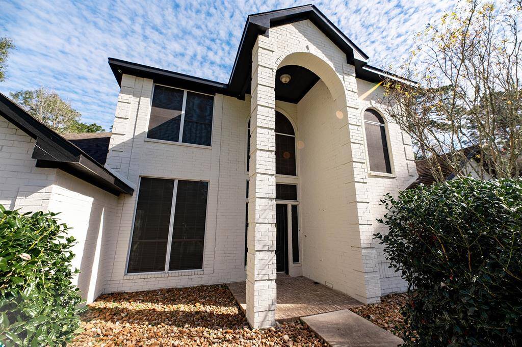 The large arch entry adds an extra touch of charm to this beautiful home.