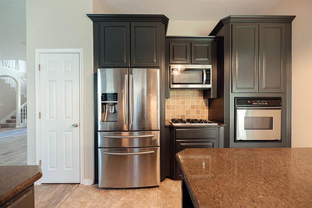 Convenient walk-in pantry for storage and organization.