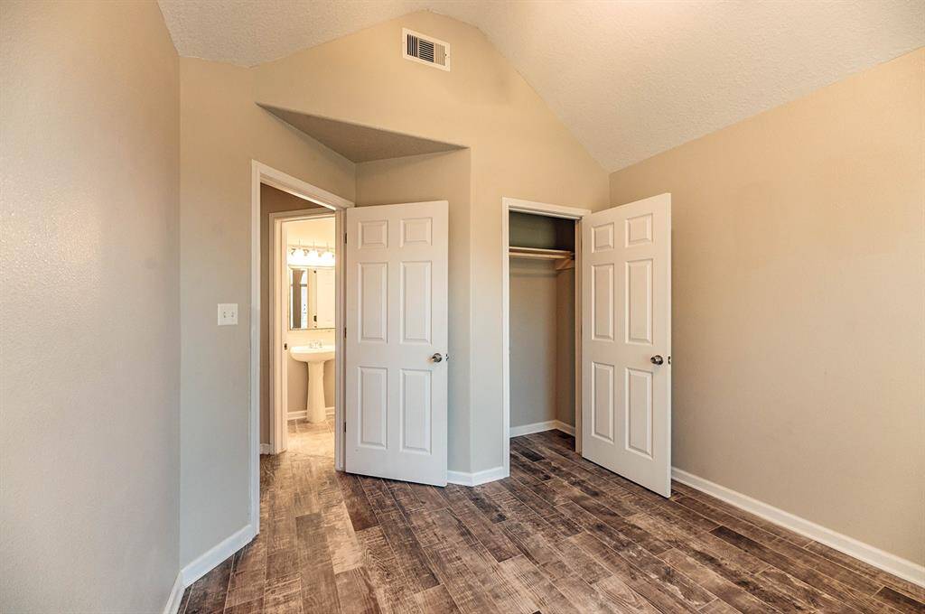 Wood-like tile throughout and a designated closet space for this additional room.