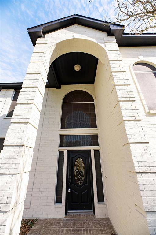 This heightened entry brings a touch of class and charm to the unique architecture of the home.