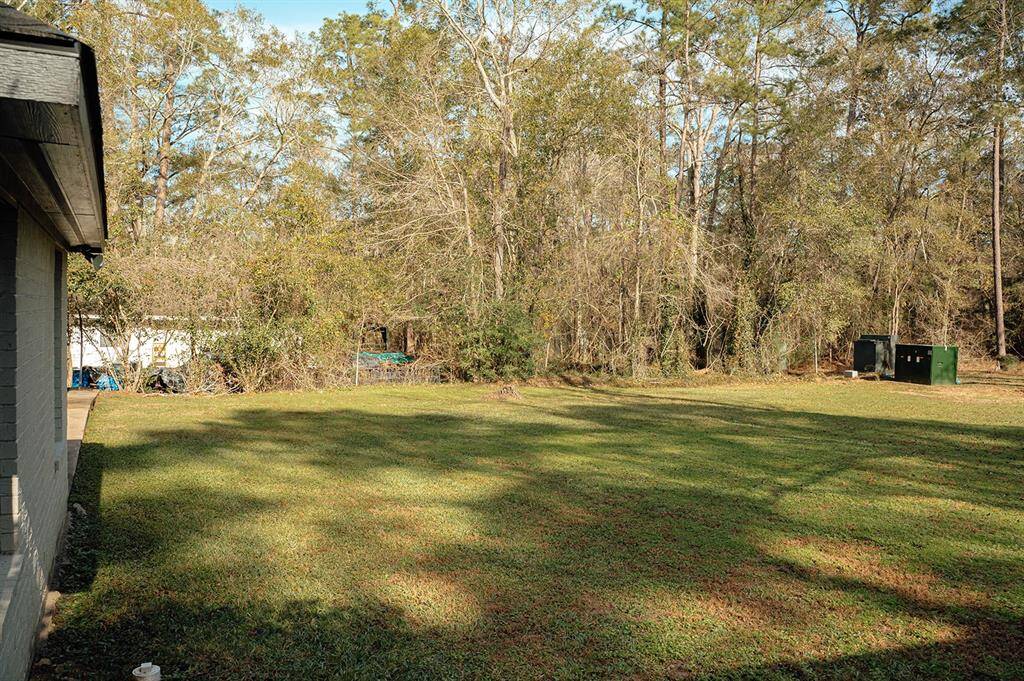 Enjoy the privacy of the surrounding wooded area.