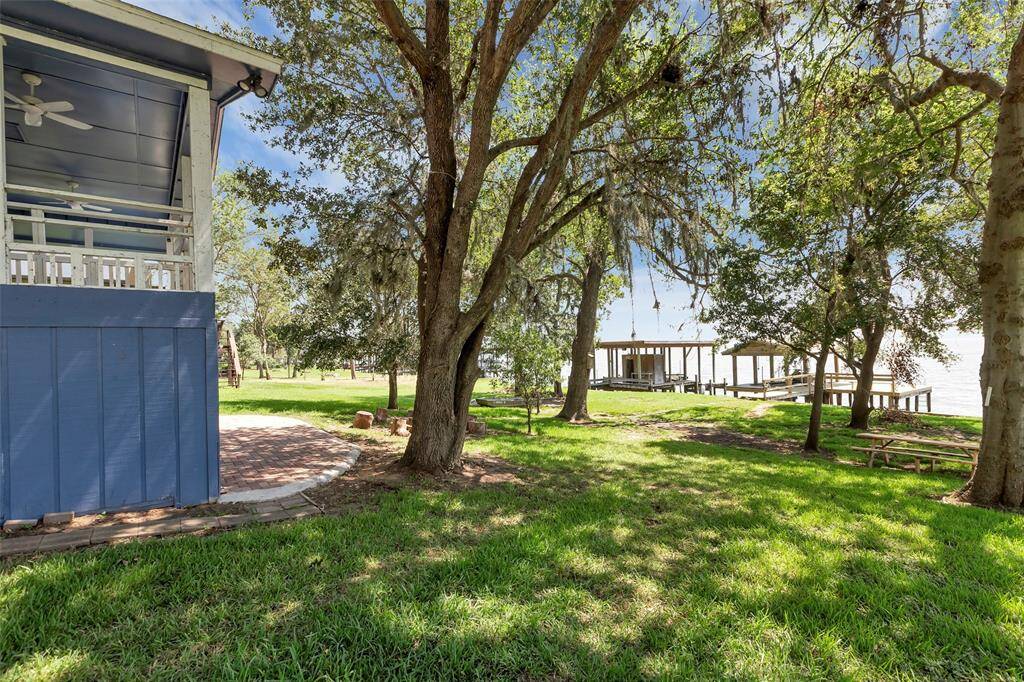 Escape to your serene, park-like retreat nestled beneath the canopy of beautiful, mature trees.