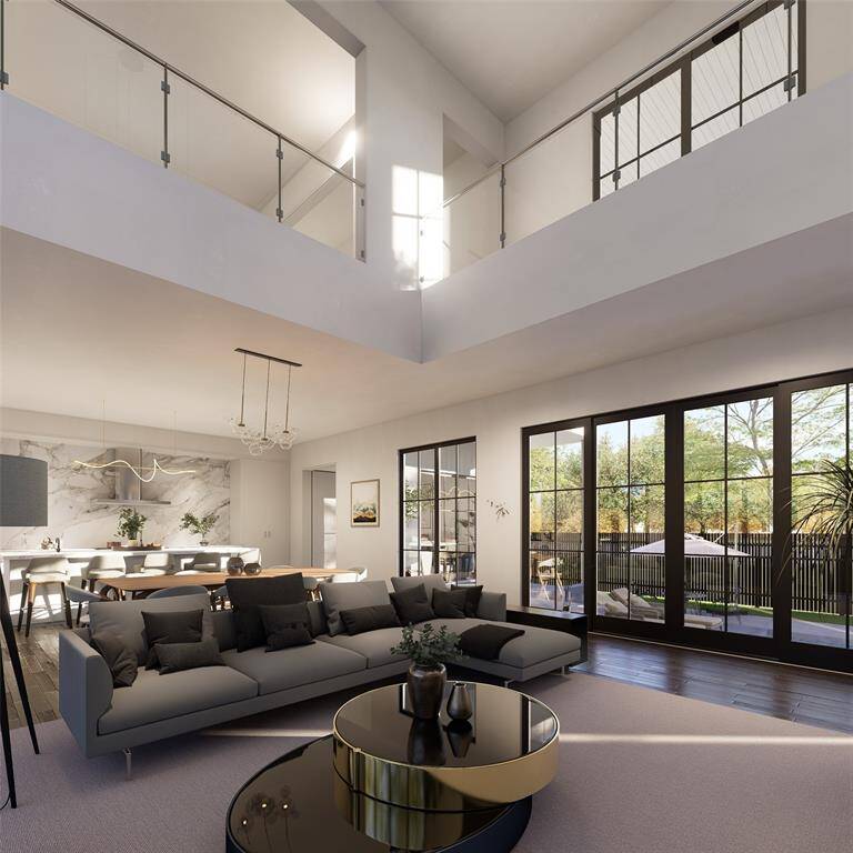 Vaulted ceilings open to upstairs living space