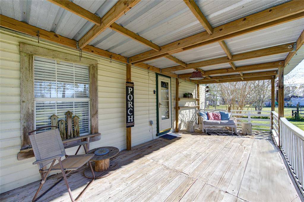 This porch is made for sweet tea and gossip.