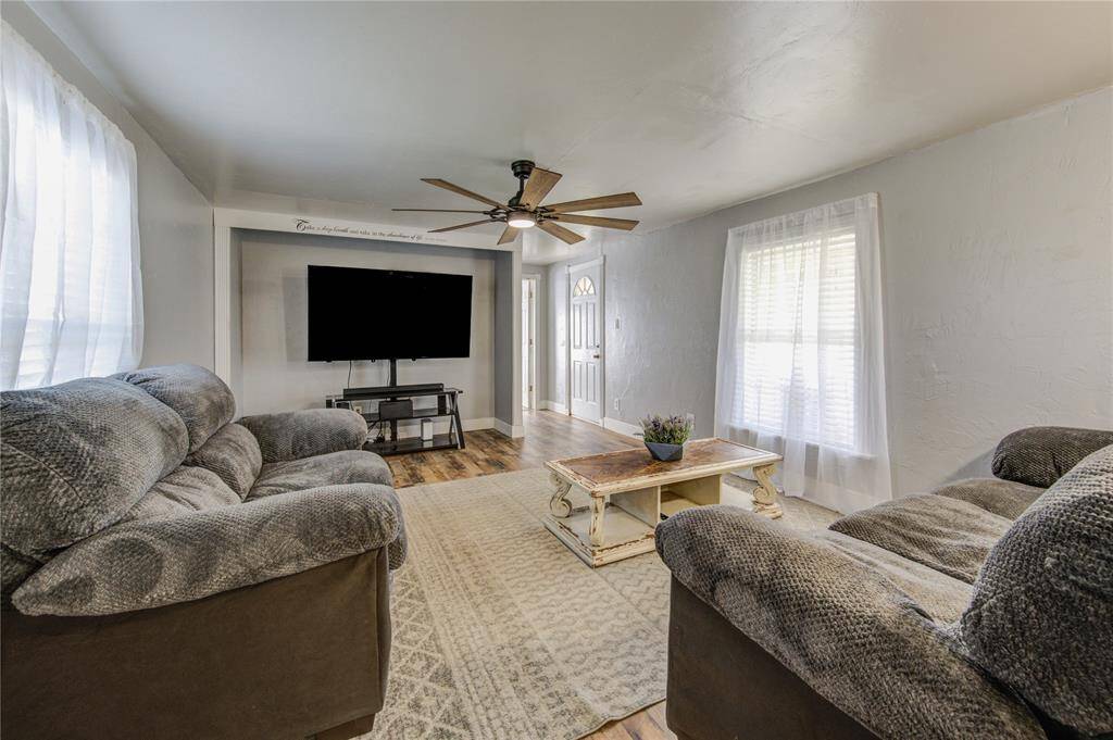 Spacious Living room leading to primary. Split floor plan!