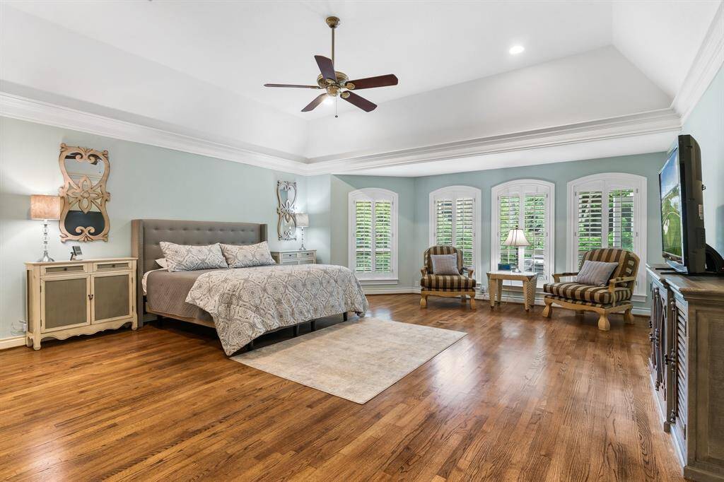 Primary bedroom with sitting area.