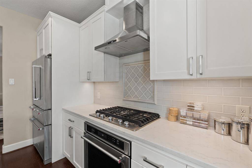 The rest of the kitchen has your convection oven, gas stove, and plenty of storage and counterspace.