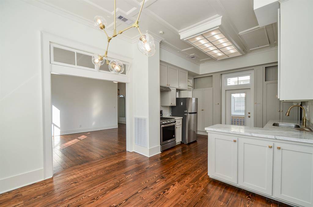 Dining area with updated lighting (2021)