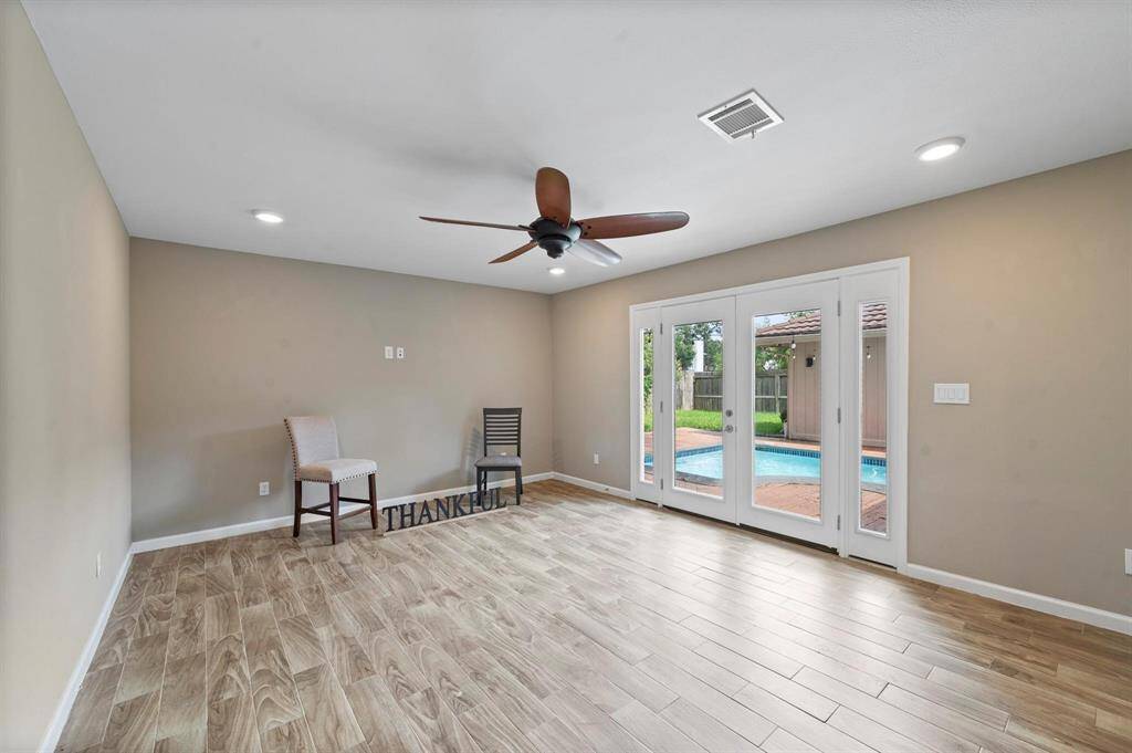 This flex space grants you access to your backyard and private pool. With a space this size, it would make an excellent game room, man cave, or whatever might suite your needs!