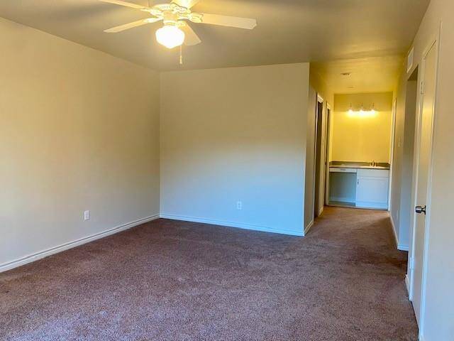 Master bedroom has vanity with sink.