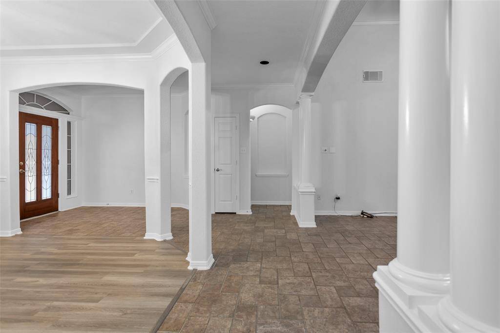 View from the kitchen towards the primary bedroom.