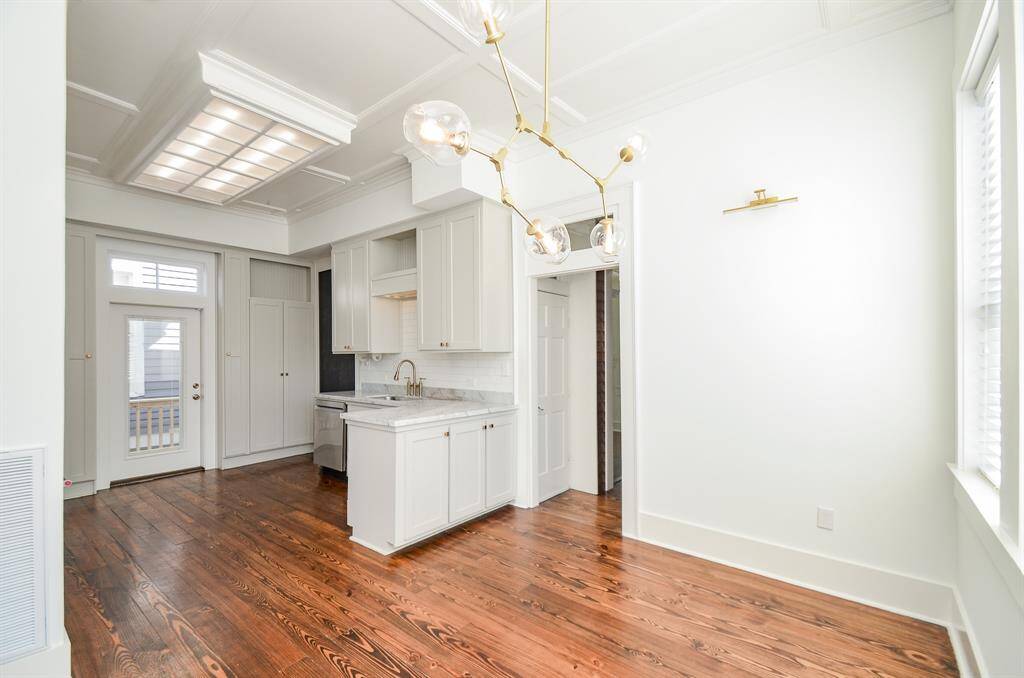 View of dining area & kitchen.