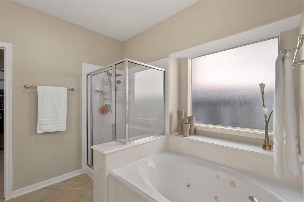 The Primary spa tub and shower are separate.