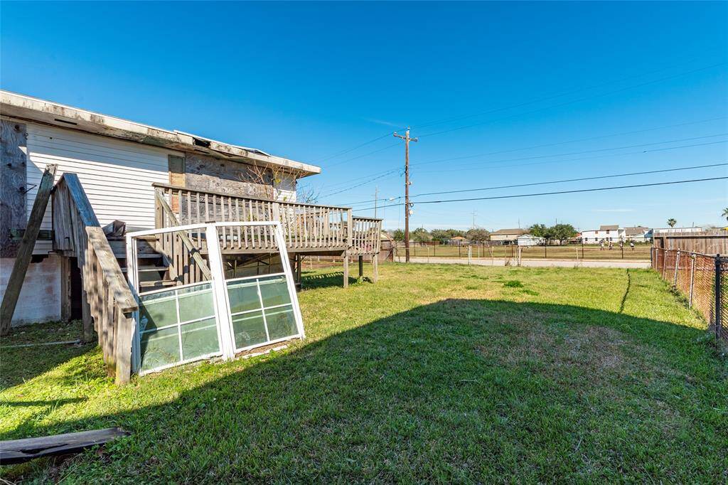 Expansive backyard with potential for customization and outdoor living.