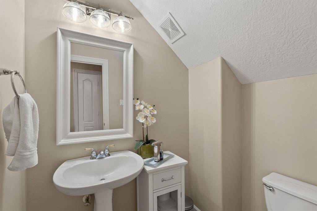 Half bath for guests downstairs.