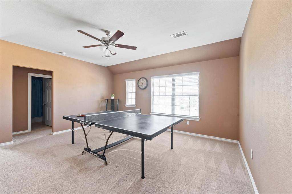 The game room on the second floor is the perfect place to host any sort of game night or friendly get-together.