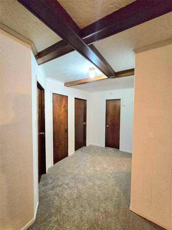 Hallway leading into secondary bedrooms
