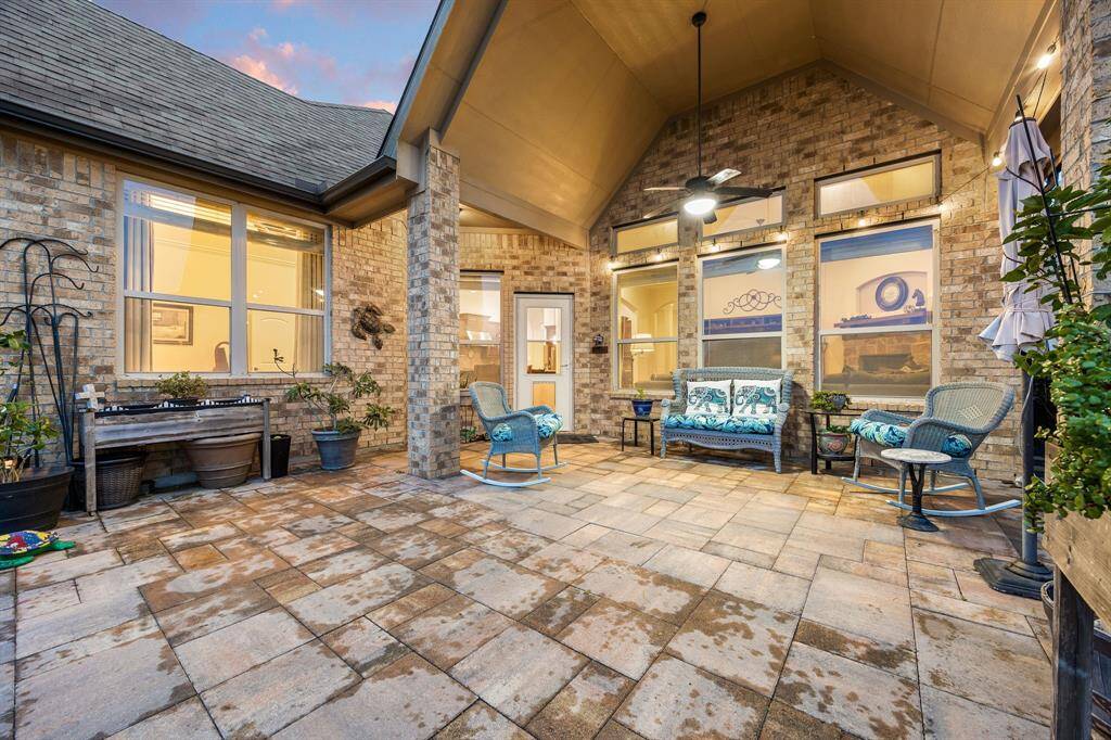 Sit back, relax and enjoy your gorgeous backyard overlooking the lake under your large covered patio. Complete with outdoor fan, plenty of space for an outdoor kitchen or grilling station and outdoor seating. Your covered patio overlooks your huge backyard with plenty of green space for the kids and your furry friends to enjoy.