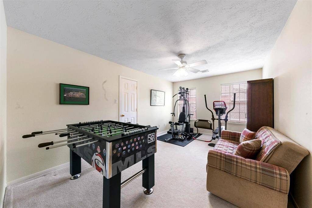 Three of the four secondary bedrooms upstairs are conveniently linked by an additional Jack and Jill bathroom. This thoughtful design offers both privacy and accessibility.