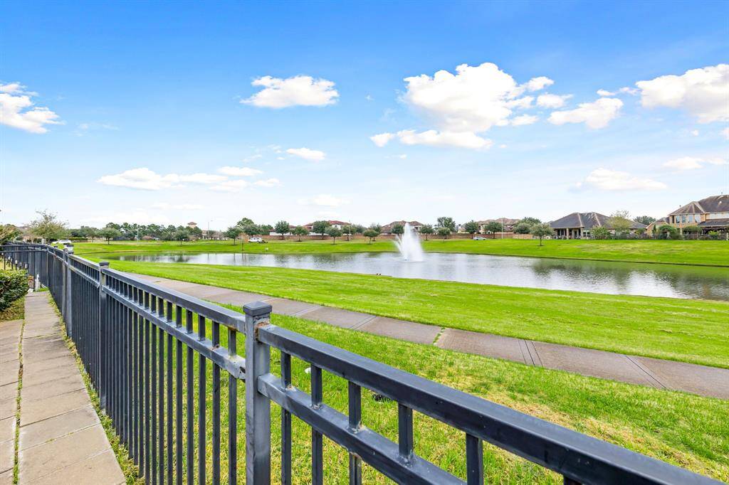 Your backyard backs up to this gorgeous lake view. Enjoy the serene and calming view from the comfort of your covered patio or walk on down to the trails for a walk with a view.