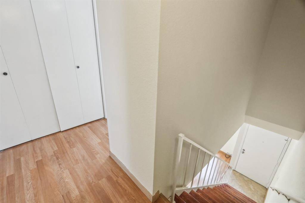 Top of staircase - then split bedrooms