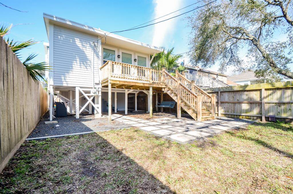 View of rear deck and covered patio.