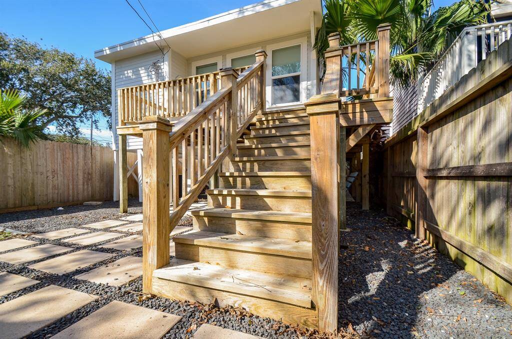 Wrap around rear deck installed in 2021 overlooks the spacious backyard. Landscaping updated in 2021.