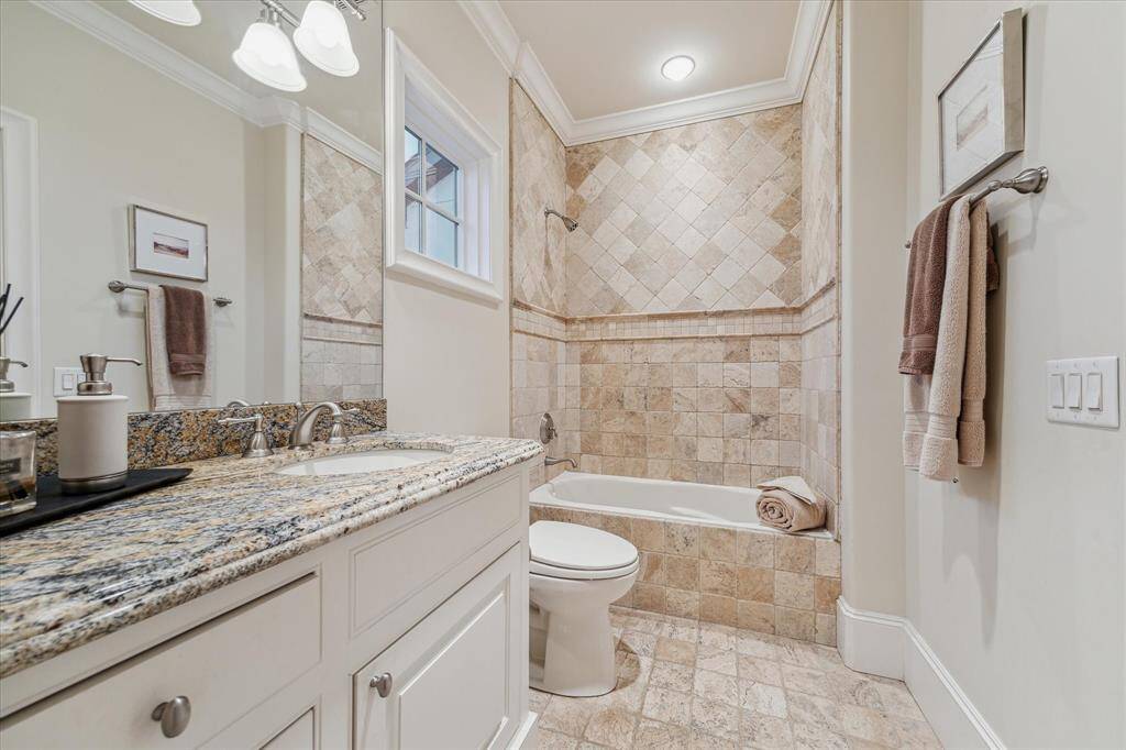 Private bathroom on fourth floor with adjacent walk-in closet.