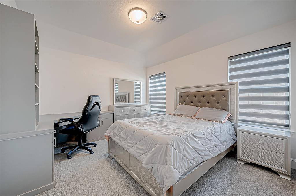 Three Upstairs Bedrooms: Each with a private ensuite and walk-in closet, these spacious rooms offer comfort and privacy for family or guests. (1 of 3)