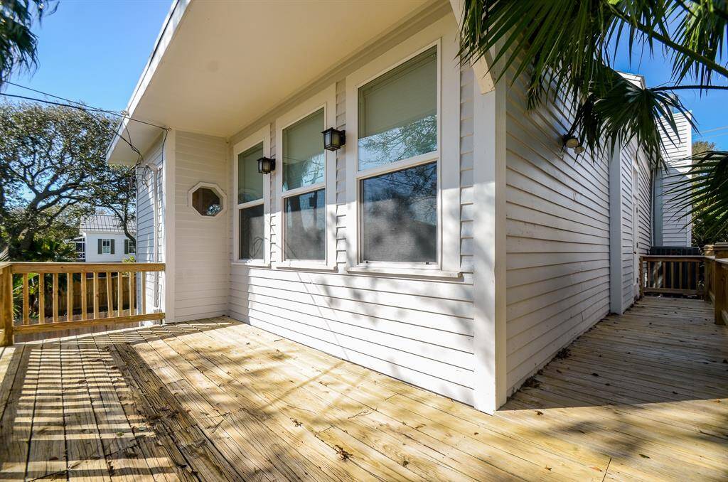 Wrap around rear deck installed in 2021 overlooks the spacious backyard.