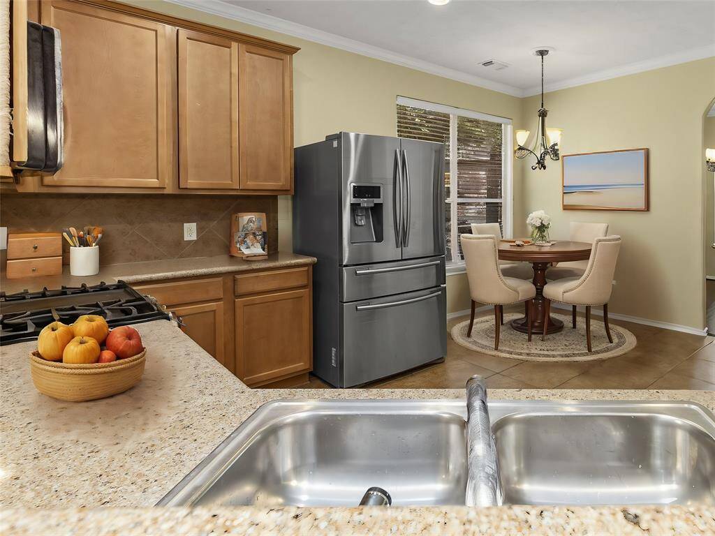 Spacious Kitchen, Gas Cook Top, Built In Microwave, New Refrigerator Included. Virtually staged.