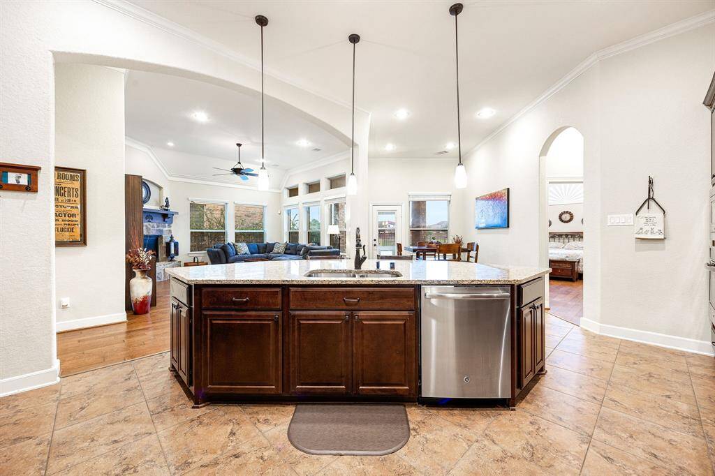 Any chef's dream, this stunning kitchen is perfect for everyday life as well as entertaining family and friends! Extra large kitchen island is perfect for conversation or that much needed space to lay out your party spread for everyone to enjoy! Large windows provide lovely views of your backyard and plenty of natural lighting throughout the day.