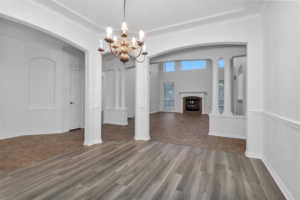 Coat closet on the left and recessed area for artwork/painting/portrait.  Don't you love a wood burning fireplace for the chilly nights?