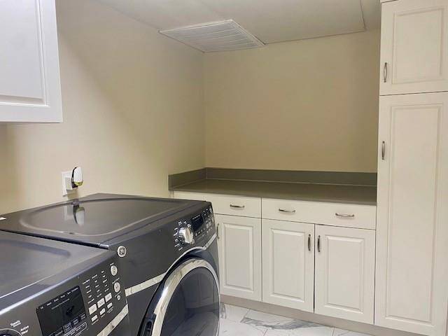 Lots of storage in utility room.