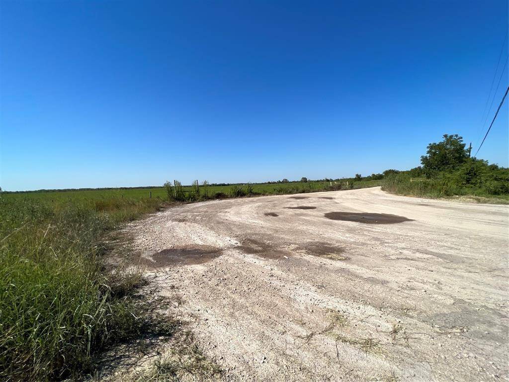 The gravel road is part of the property.