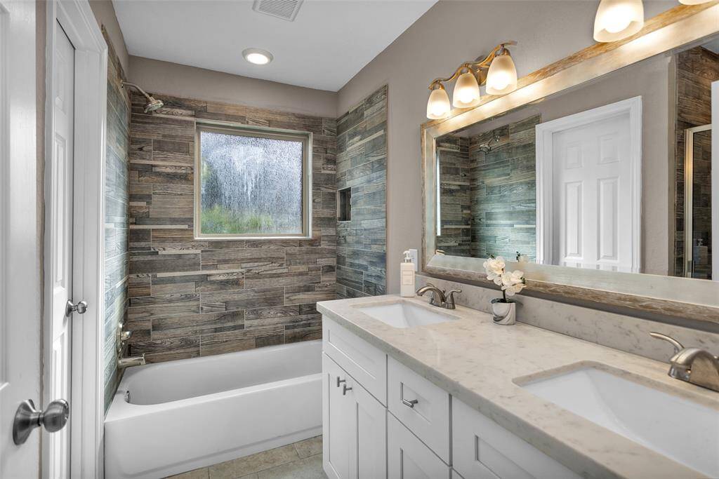 Dual sinks with a peaceful spa feel.