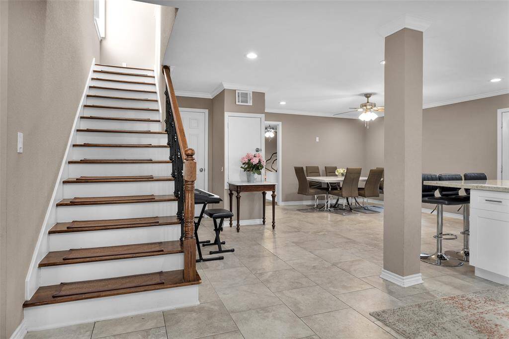 Welcome Home! Nestled on almost 1/3 acre, circle driveway, and 2 Primary bedrooms, this home has it all!