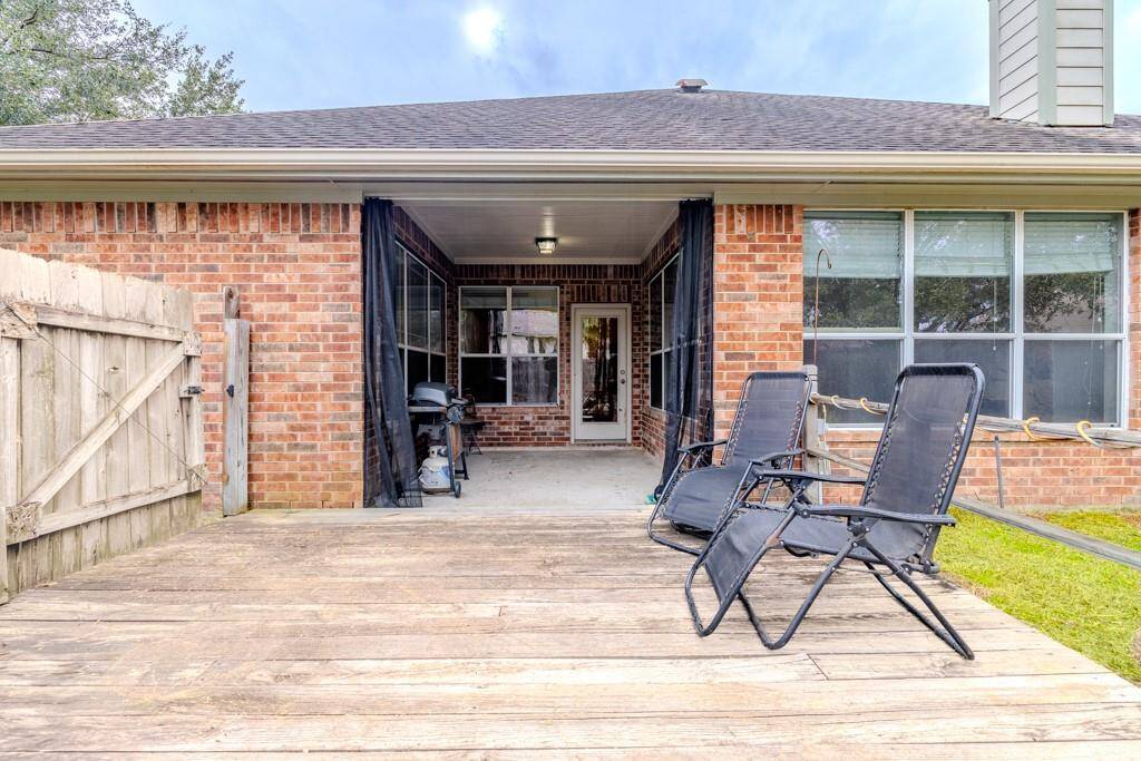 One of TWO patios! This one right off the kitchen would be perfect for outdoor kitchen.