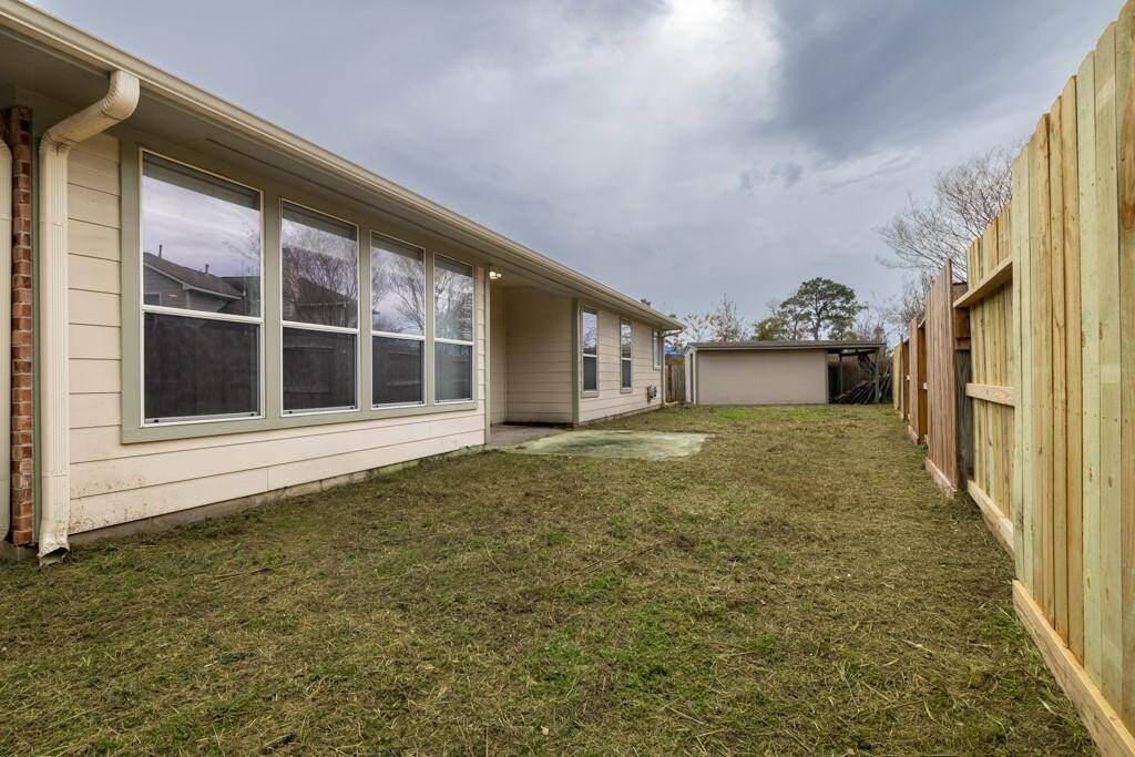 This is the second patio off the living room with another piece of the HUGE back yard